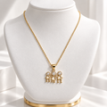 Gold-Plated Chain with 3 Children CZ Pendant