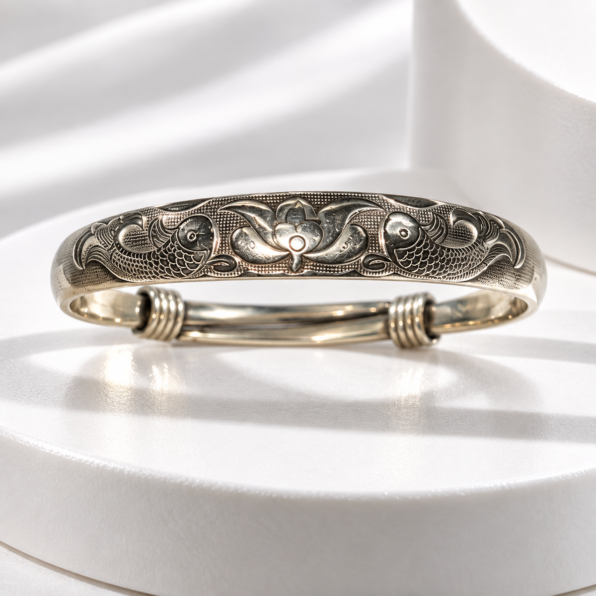 The Lotus Bracelet Fish & Lotus Engraved Silver-Tone Bangle — Pre-Loved.