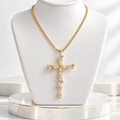 Gold-Tone Twisted Chain with Cubic Zirconia Cross
